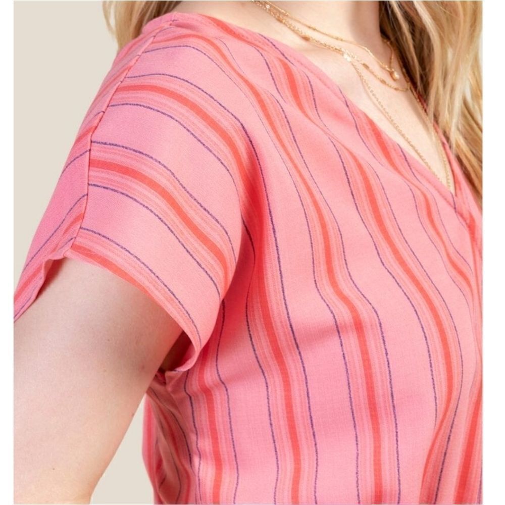 NWTā
PinkācabanaĀ romper - Picture 2 of 4